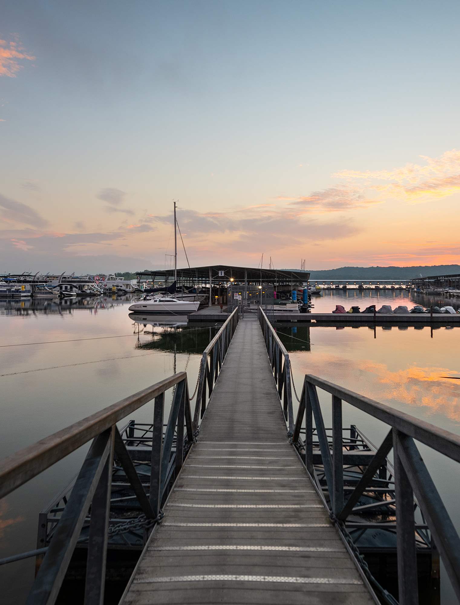 Marina boardwalk to dock sunset
